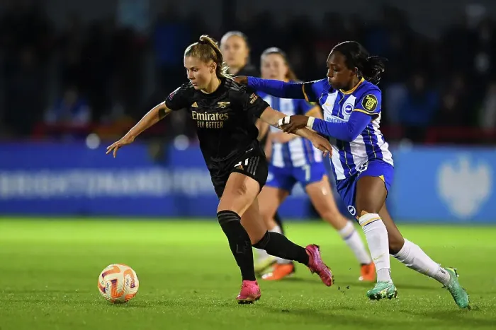Framed Print : Arsenal's Victoria Pelova Faces Pressure from Brighton's Danielle Carter in FA Women's Super League Clash