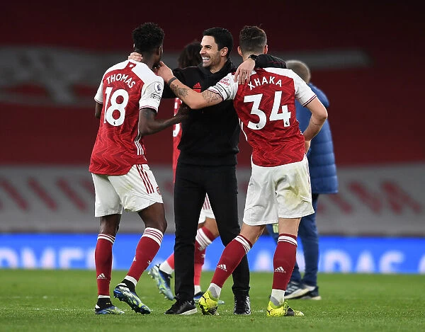 Arsenal's Victory: Arteta Celebrates with Partey and Xhaka