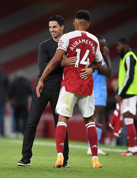 Arsenal's Victory: Arteta Embraces Aubameyang after Arsenal v West Ham United (2020-21)