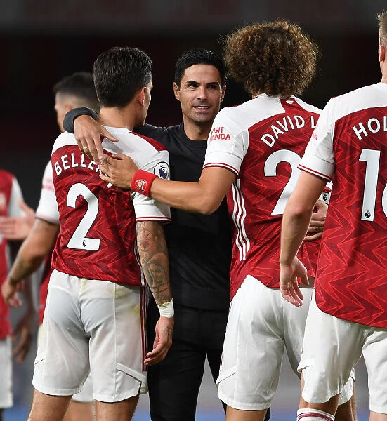 Arsenal's Victory: Arteta Embraces Bellerin and Luiz After Arsenal v West Ham United (2020-21)
