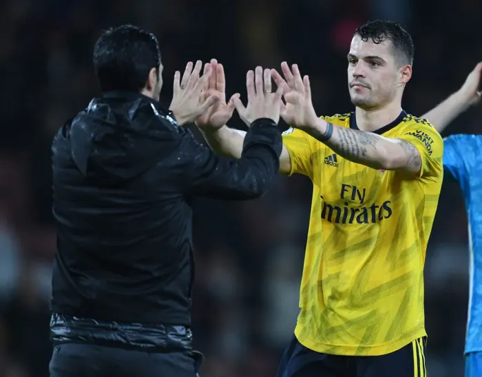 Framed Print : Arsenal's Victory at Bournemouth: Mikel Arteta Consoles Granit Xhaka Framed Print : Arsenal's Victory at Bournemouth: Mikel Arteta Consoles Granit Xhaka