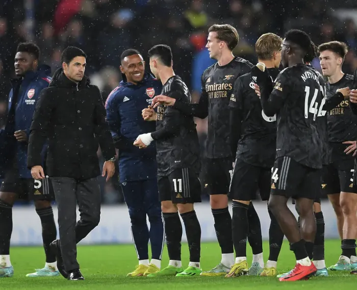 Framed Print : Arsenal's Victory Celebration: Arteta and Nketiah Rejoice after Beating Brighton in the Premier League 2022-23