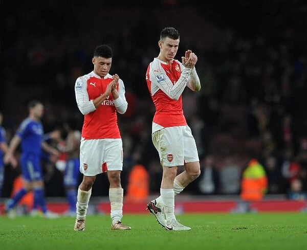 Arsenal's Victory Celebration: Koscielny and Oxlade-Chamberlain Amidst Jubilant Fans (Arsenal vs Chelsea, 2015-16)