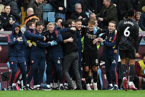 Arsenal's Victory Celebration: Mikel Arteta and Staff After scoring Four Goals Against Aston Villa (Aston Villa vs Arsenal 2022-23)