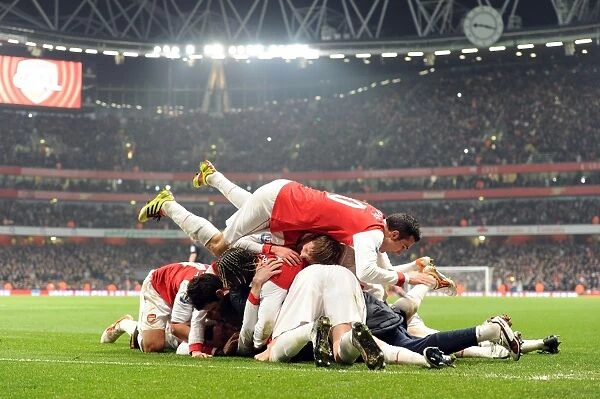 Arsenal's Victory: Koscielny and Teammates Celebrate Second Goal Against Everton (2-1)