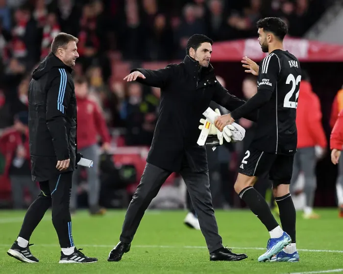 Framed Print : Arsenal's Victory: Mikel Arteta Celebrates with David Raya after Arsenal v Burnley in 2023-24 Premier League