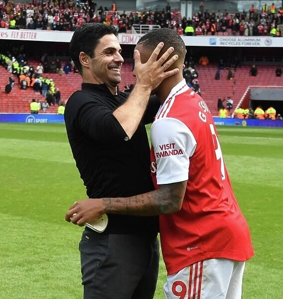 Arsenal's Victory: Mikel Arteta and Gabriel Jesus Celebrate Over Tottenham in the Premier League (2022-23)