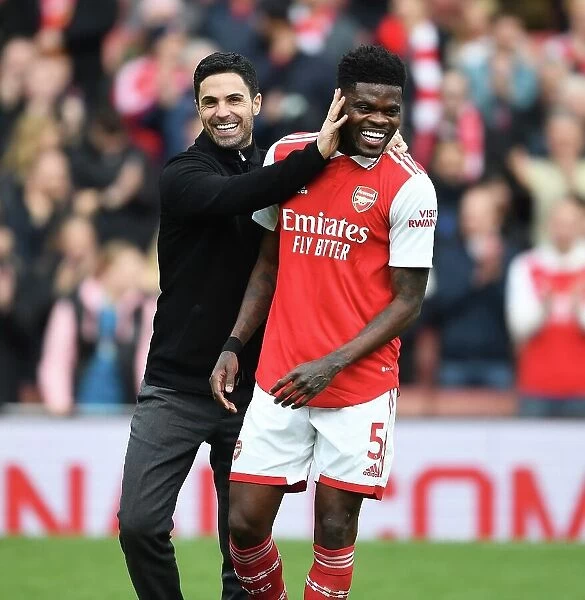 Arsenal's Victory: Mikel Arteta and Thomas Partey Celebrate Against Crystal Palace (2022-23)