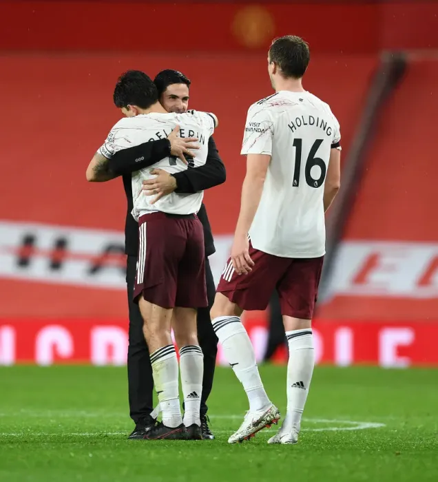 Framed Print : Arsenal's Victory at Old Trafford: Arteta and Bellerin Celebrate Amidst Empty Stands (Manchester United vs Arsenal, 2020-21) Framed Print : Arsenal's Victory at Old Trafford: Arteta and Bellerin Celebrate Amidst Empty Stands (Manchester United vs Arsenal, 2020-21)