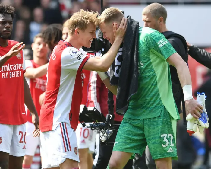 Framed Print : Arsenal's Victory: Ramsdale and Odegaard Celebrate Over Manchester United