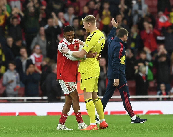 Arsenal's Victory: Reiss Nelson and Aaron Ramsdale Celebrate Against Nottingham Forest (2022-23)