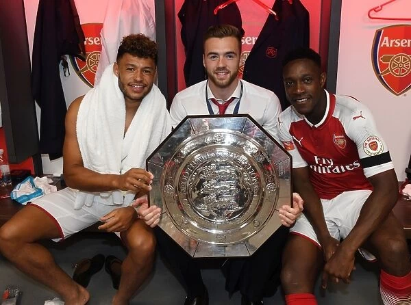 Arsenal's Victory Triumph: Oxlade-Chamberlain, Chambers, and Welbeck Celebrate FA Community Shield