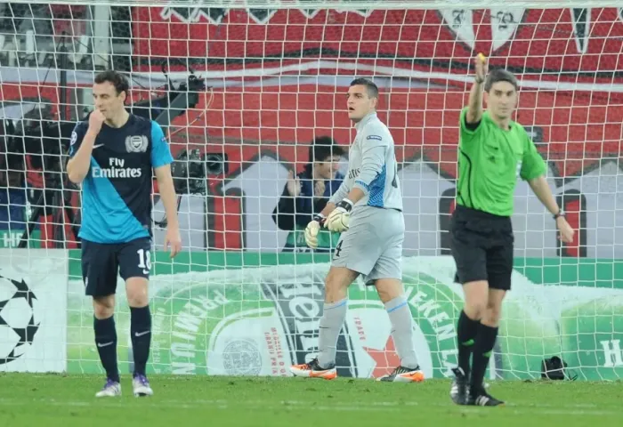 Framed Print : Arsenal's Vito Mannone Conceding to Olympiacos in UEFA Champions League (2011-12)