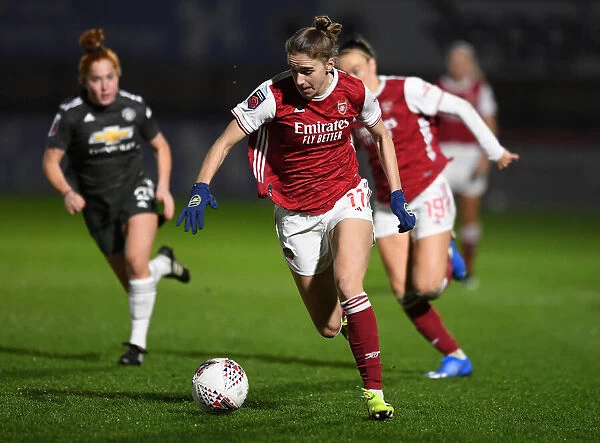 Arsenal's Vivianne Miedema in Action against Manchester United Women in FA WSL Amidst Empty Stands (2020-21)