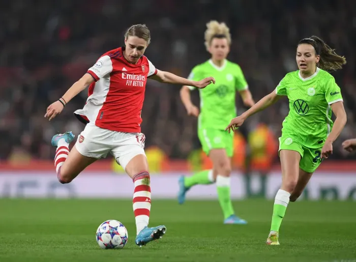 Framed Print : Arsenal's Vivianne Miedema Faces Off Against Wolfsburg's Joelle Wedemeyer in UEFA Women's Champions League Quarterfinal Framed Print : Arsenal's Vivianne Miedema Faces Off Against Wolfsburg's Joelle Wedemeyer in UEFA Women's Champions League Quarterfinal