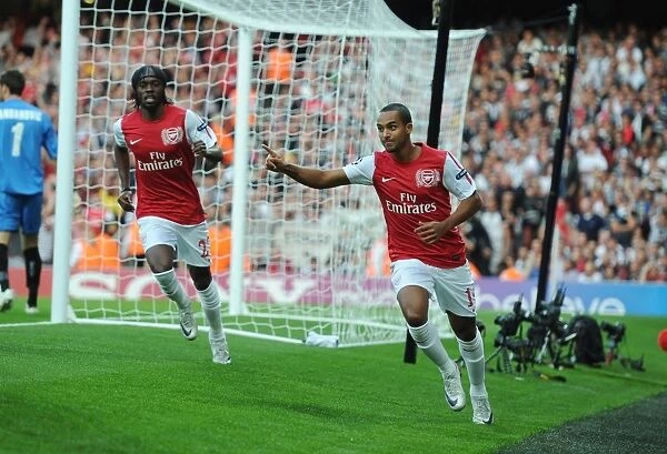 Arsenal's Walcott and Gervinho: Celebrating a Goal in the 2011-12 UEFA Champions League (vs Udinese)