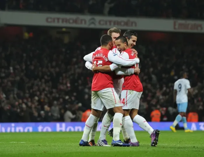 Framed Print : Arsenal's Walcott, Oxlade-Chamberlain, Ramsey, and van Persie Celebrate Goals Against Aston Villa in FA Cup Fourth Round Framed Print : Arsenal's Walcott, Oxlade-Chamberlain, Ramsey, and van Persie Celebrate Goals Against Aston Villa in FA Cup Fourth Round