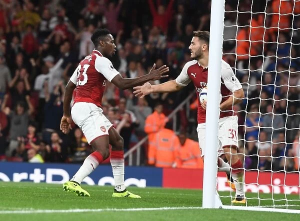 Arsenal's Welbeck and Kolasinac Celebrate Goals Against Leicester City (2017-18)