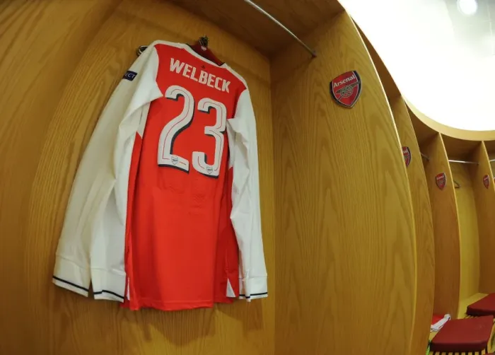 Framed Print : Arsenal's Welbeck: Pre-Match Focus in the Changing Room before Arsenal vs. Bayern Munich (2016-17)