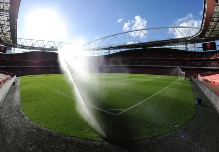 Framed Print : Arsenal's Wet Victory: 3-0 Over Burnley in the Premier League