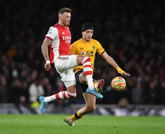 Framed Print : Arsenal's White Faces Off Against Jimenez: A Premier League Showdown Framed Print : Arsenal's White Faces Off Against Jimenez: A Premier League Showdown