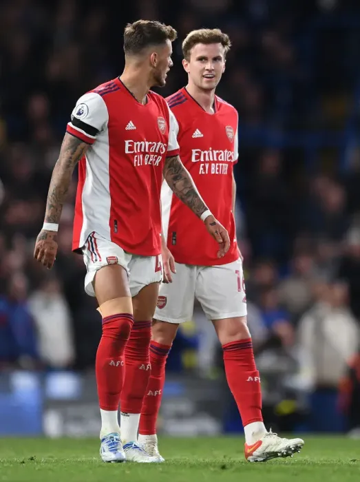 Framed Print : Arsenal's White and Holding Face Off Against Chelsea in Premier League Showdown Framed Print : Arsenal's White and Holding Face Off Against Chelsea in Premier League Showdown