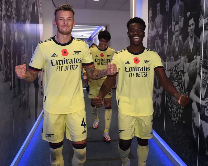 Framed Print : Arsenal's White and Saka Celebrate Victory Over Leicester City in 2021-22 Premier League
