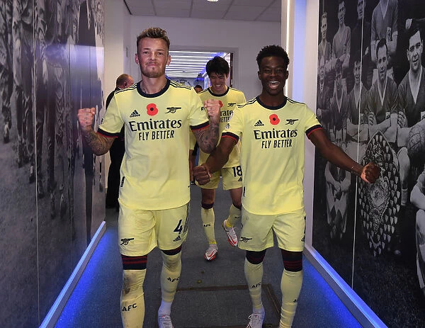 Arsenal's White and Saka Celebrate Win Against Leicester City (2021-22)