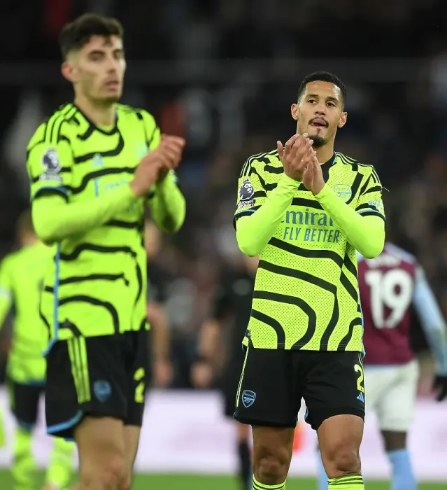 Framed Print : Arsenal's William Saliba Celebrates with Fans after Aston Villa Victory (2023-24)