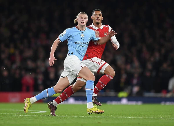 Arsenal's William Saliba Chases Manchester City's Erling Haaland in Premier League Showdown