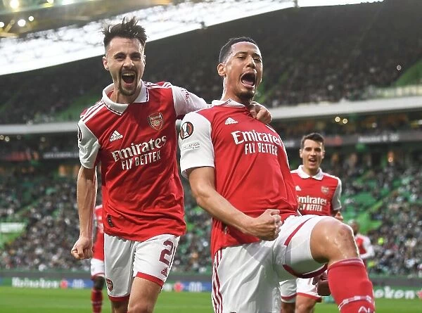 Arsenal's William Saliba and Fabio Vieira Celebrate Goal in Europa League Clash against Sporting Lisbon