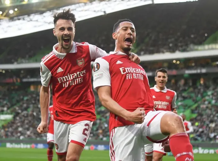 Framed Print : Arsenal's William Saliba and Fabio Vieira Celebrate Goal in Europa League Clash against Sporting Lisbon Framed Print : Arsenal's William Saliba and Fabio Vieira Celebrate Goal in Europa League Clash against Sporting Lisbon