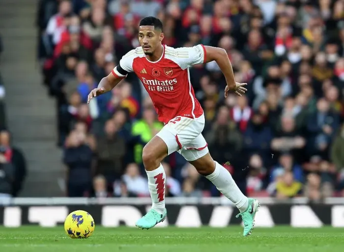Framed Print : Arsenal's William Saliba Sprints Past Burnley Defenders in 2023-24 Premier League Clash Framed Print : Arsenal's William Saliba Sprints Past Burnley Defenders in 2023-24 Premier League Clash