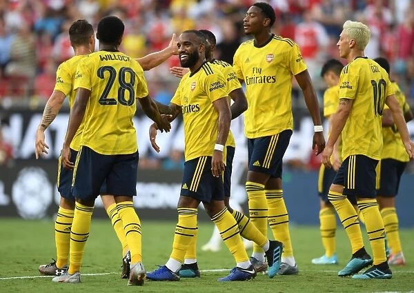 Arsenal's Willock and Lacazette Celebrate Goals in 2019 International Champions Cup Win against Fiorentina