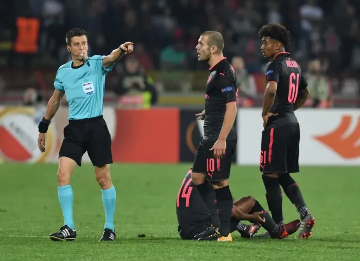Framed Print : Arsenal's Wilshere and Nelson Protest Referee Decision Against Crvena Zvezda