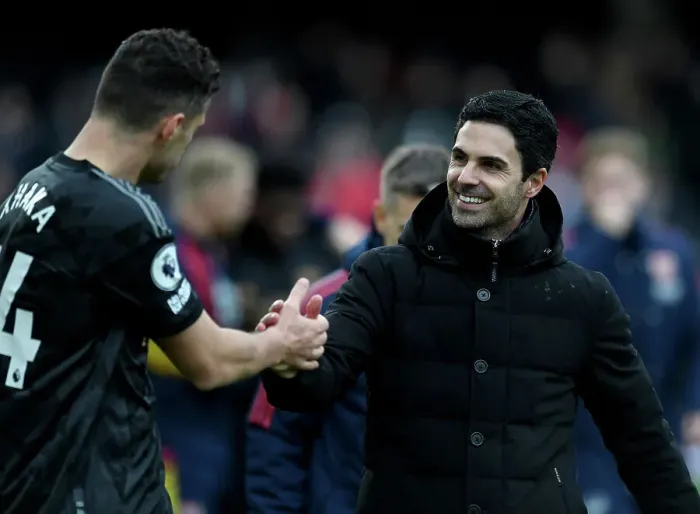 Framed Print : Arsenal's Winning Duo: Arteta and Xhaka Celebrate Premier League Victory over Fulham