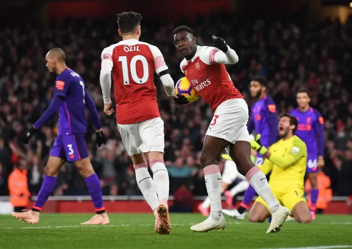 Framed Print : Arsenal's Winning Moment: Welbeck and Ozil Celebrate Goal vs. Liverpool (2018-19)