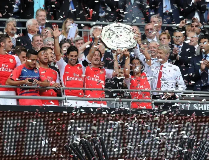 Framed Print : Arsenal's Winning Squad: Arteta, Rosicky, Cazorla, and Wenger Celebrate FA Community Shield Triumph Framed Print : Arsenal's Winning Squad: Arteta, Rosicky, Cazorla, and Wenger Celebrate FA Community Shield Triumph