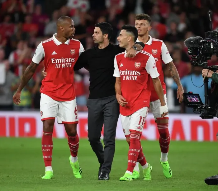 Framed Print : Arsenal's Winning Team: Arteta Celebrates with Gabriel, Martinelli, and White