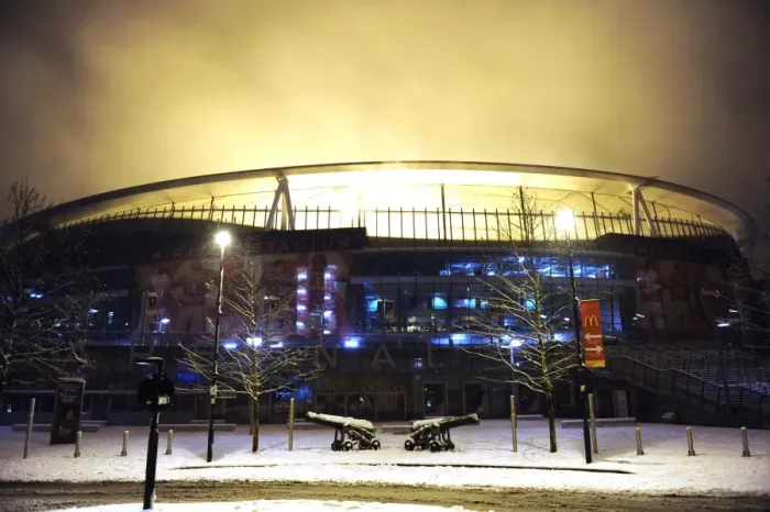 Framed Print : Arsenal's Winter Battlefield: Snowy Emirates Stadium in the Premier League Framed Print : Arsenal's Winter Battlefield: Snowy Emirates Stadium in the Premier League