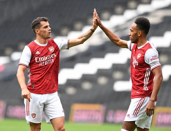 Arsenal's Xhaka and Aubameyang in Action against MK Dons during 2020 Pre-Season Friendly