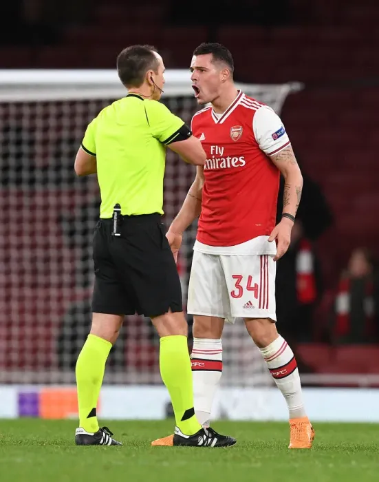 Framed Print : Arsenal's Xhaka Booked in Europa League Clash Against Eintracht Frankfurt