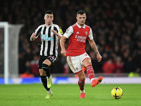 Arsenal's Xhaka Clashes with Newcastle's Almiron in Premier League Showdown