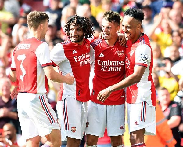 Arsenal's Xhaka, Elneny, and Aubameyang Celebrate Goal Against Chelsea in Pre-Season Friendly