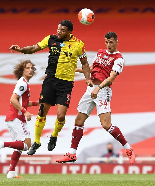 Arsenal's Xhaka Faces Off Against Deeney in Intense Arsenal v Watford Clash (2019-20)