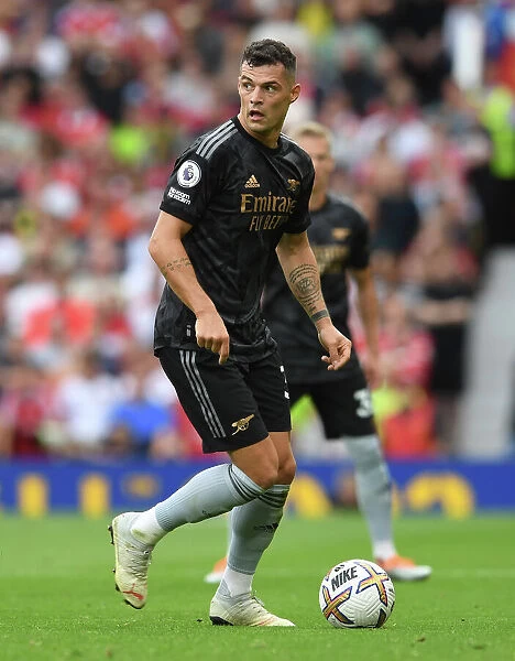 Arsenal's Xhaka Faces Off Against Manchester United at Old Trafford (2022-23 Premier League)