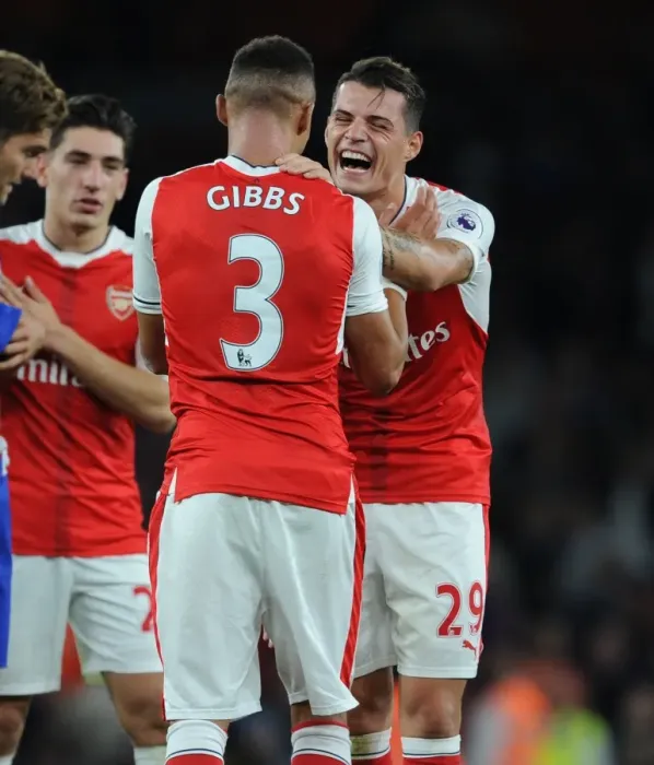 Framed Print : Arsenal's Xhaka and Gibbs: A Moment of Relief after Arsenal vs. Chelsea (2016-17) Framed Print : Arsenal's Xhaka and Gibbs: A Moment of Relief after Arsenal vs. Chelsea (2016-17)