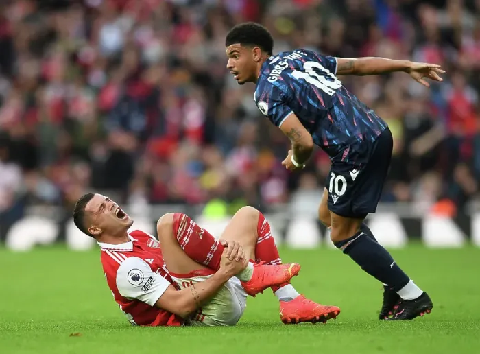 Framed Print : Arsenal's Xhaka Injured in Intense Clash with Nottingham Forest's Gibbs-White Framed Print : Arsenal's Xhaka Injured in Intense Clash with Nottingham Forest's Gibbs-White