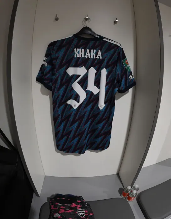 Framed Print : Arsenal's Xhaka Jersey in Anfield Changing Room - Carabao Cup Semi-Final Showdown: Liverpool vs Arsenal (2021-2022)