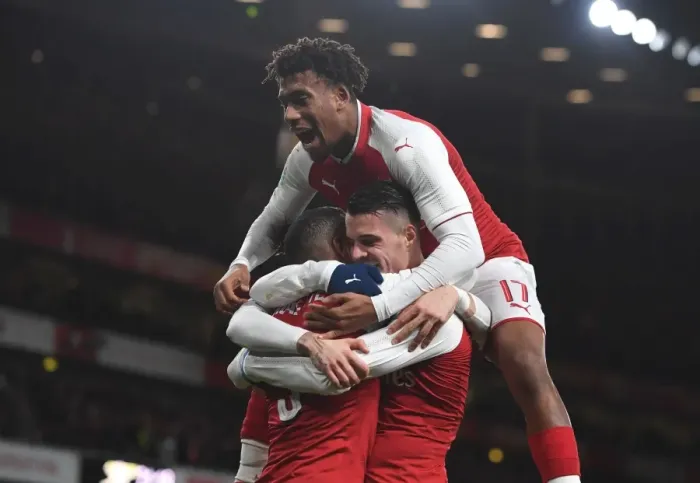 Framed Print : Arsenal's Xhaka, Lacazette, and Iwobi Celebrate Goals in Carabao Cup Semi-Final against Chelsea Framed Print : Arsenal's Xhaka, Lacazette, and Iwobi Celebrate Goals in Carabao Cup Semi-Final against Chelsea
